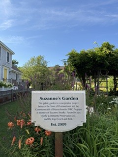 Entrance sign for Suzanne's Garden at 608 Commercial St, Provincetown